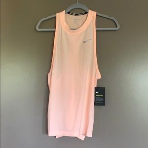 Nike Women’s Breathe Running Tank in Peach